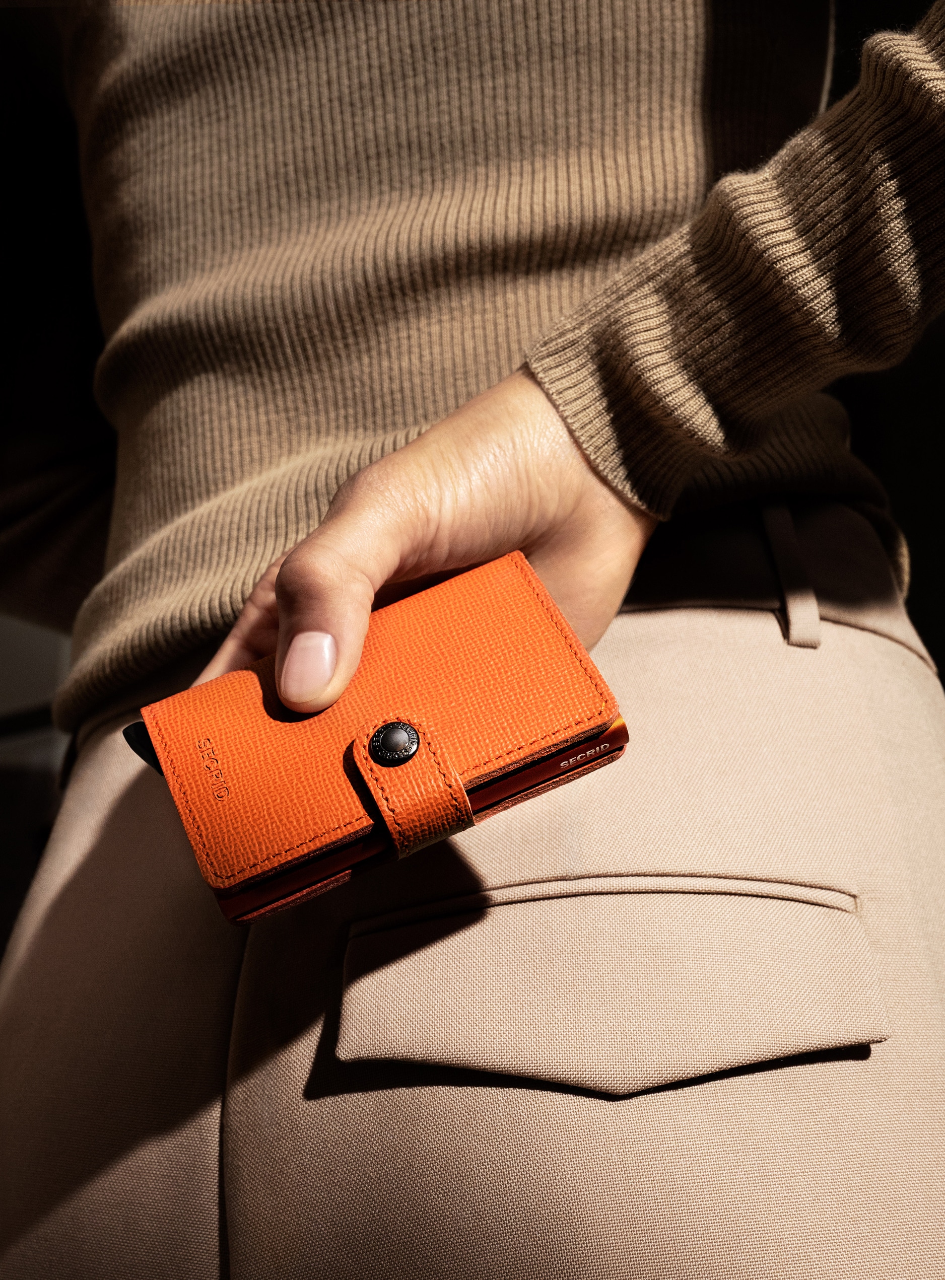 Real life image of the miniwallet-crisple-pumpkin wallet