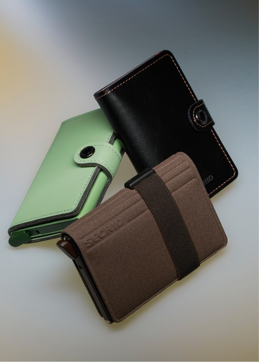 Three card holders with brown and green tones