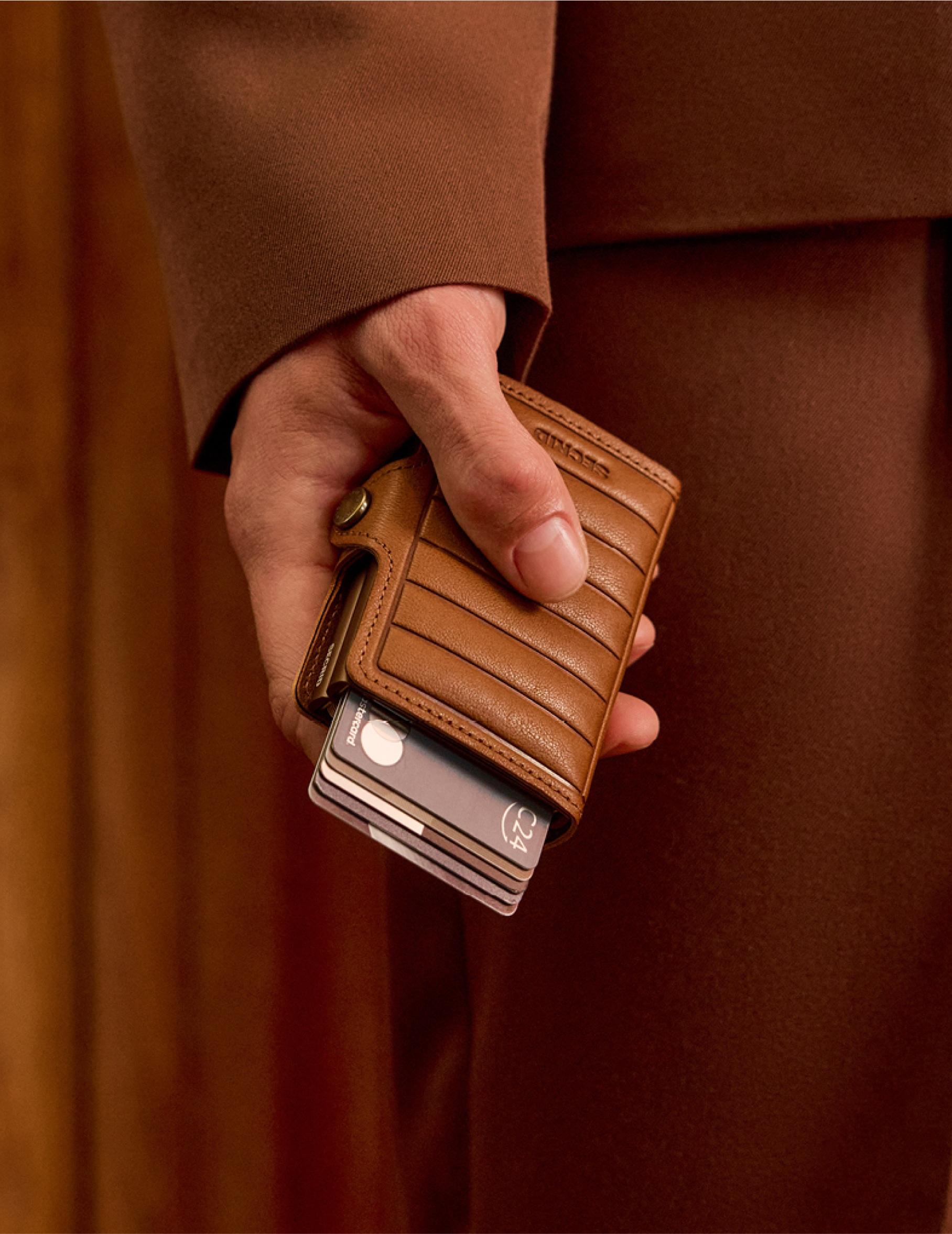 Brown wallet with horizontal lines and cards popped out