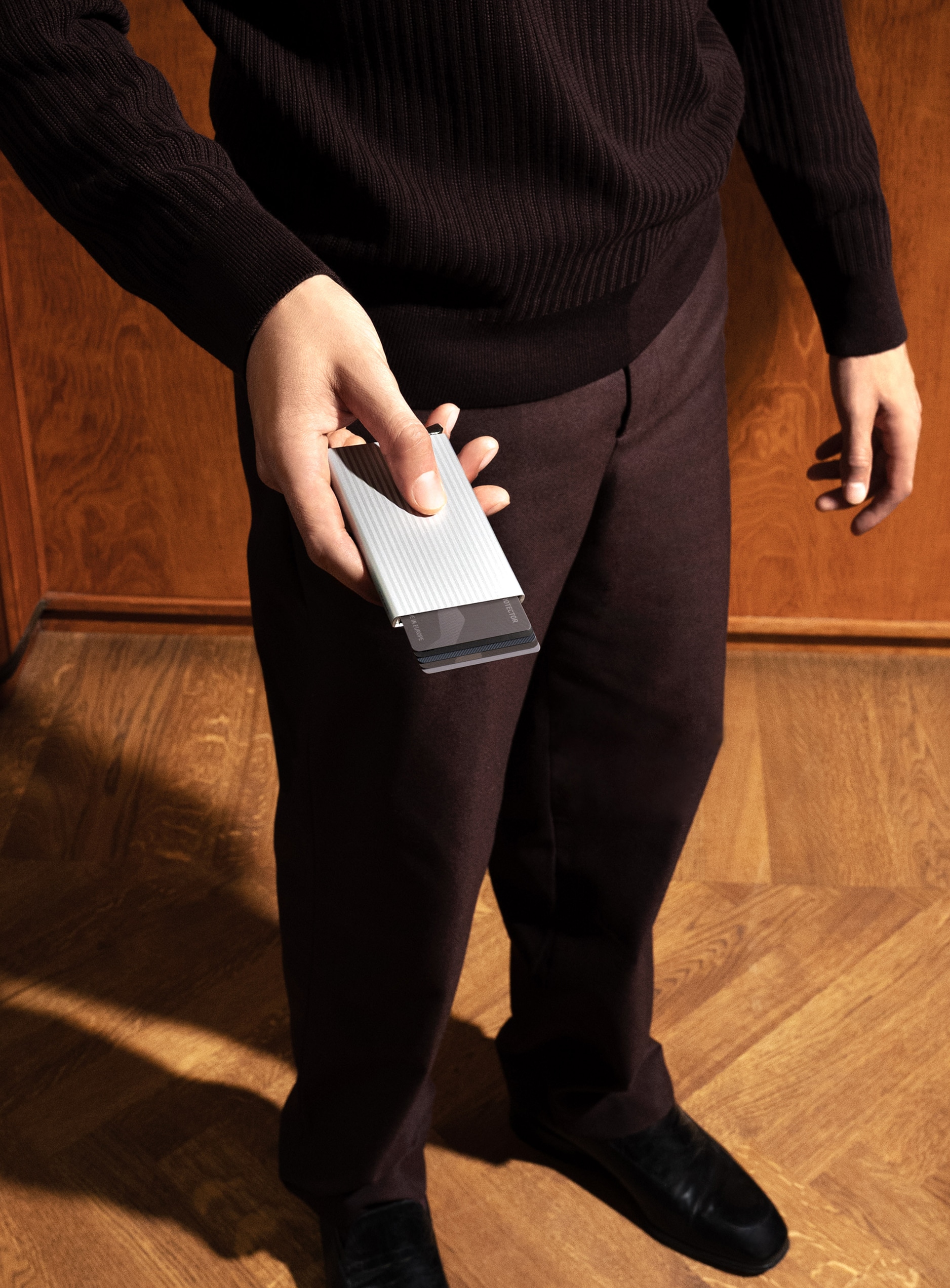 Real life image of the premium-cardprotector-fluted-silver-- wallet