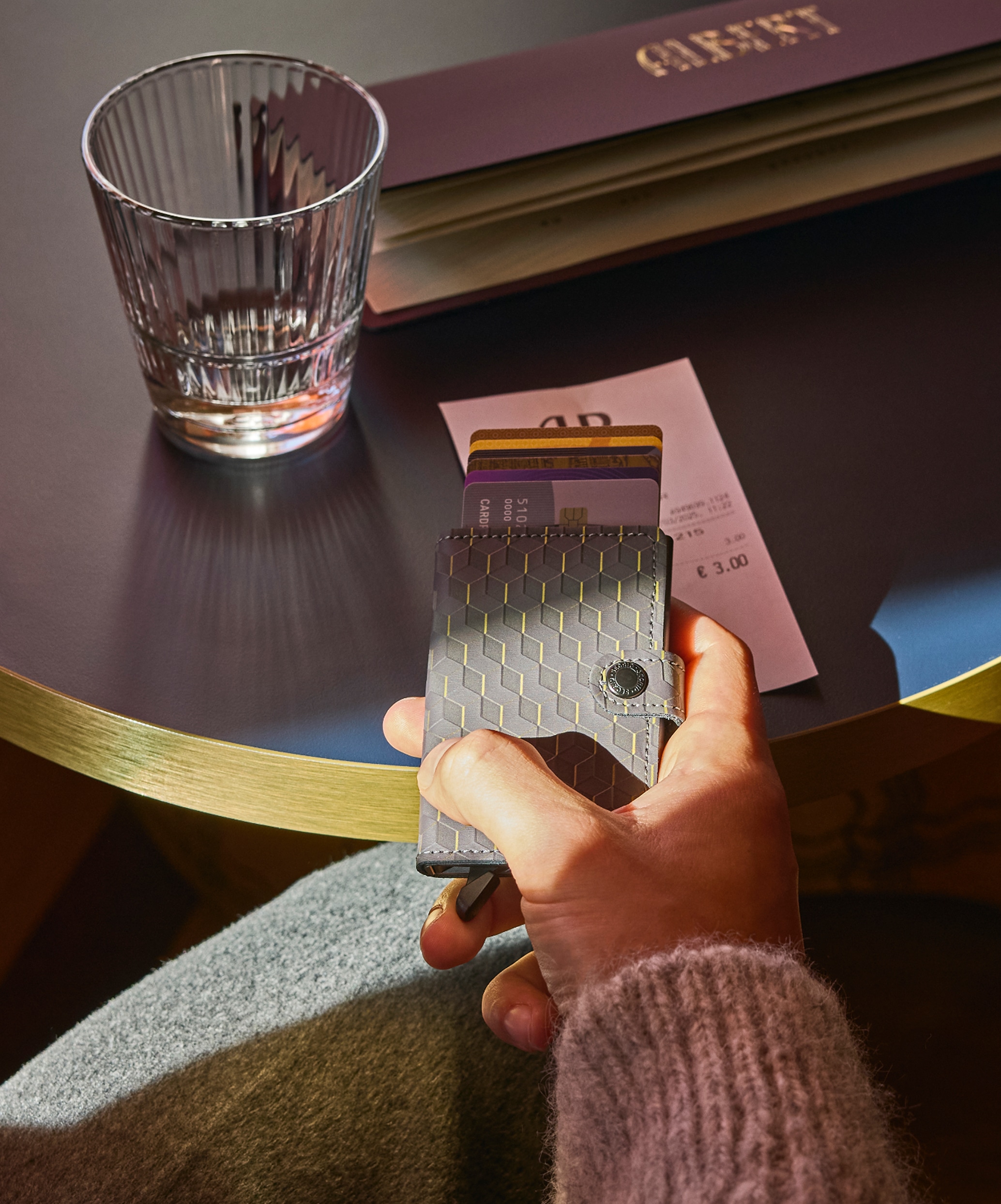 Real life image of the miniwallet-optical-grey-yellow wallet