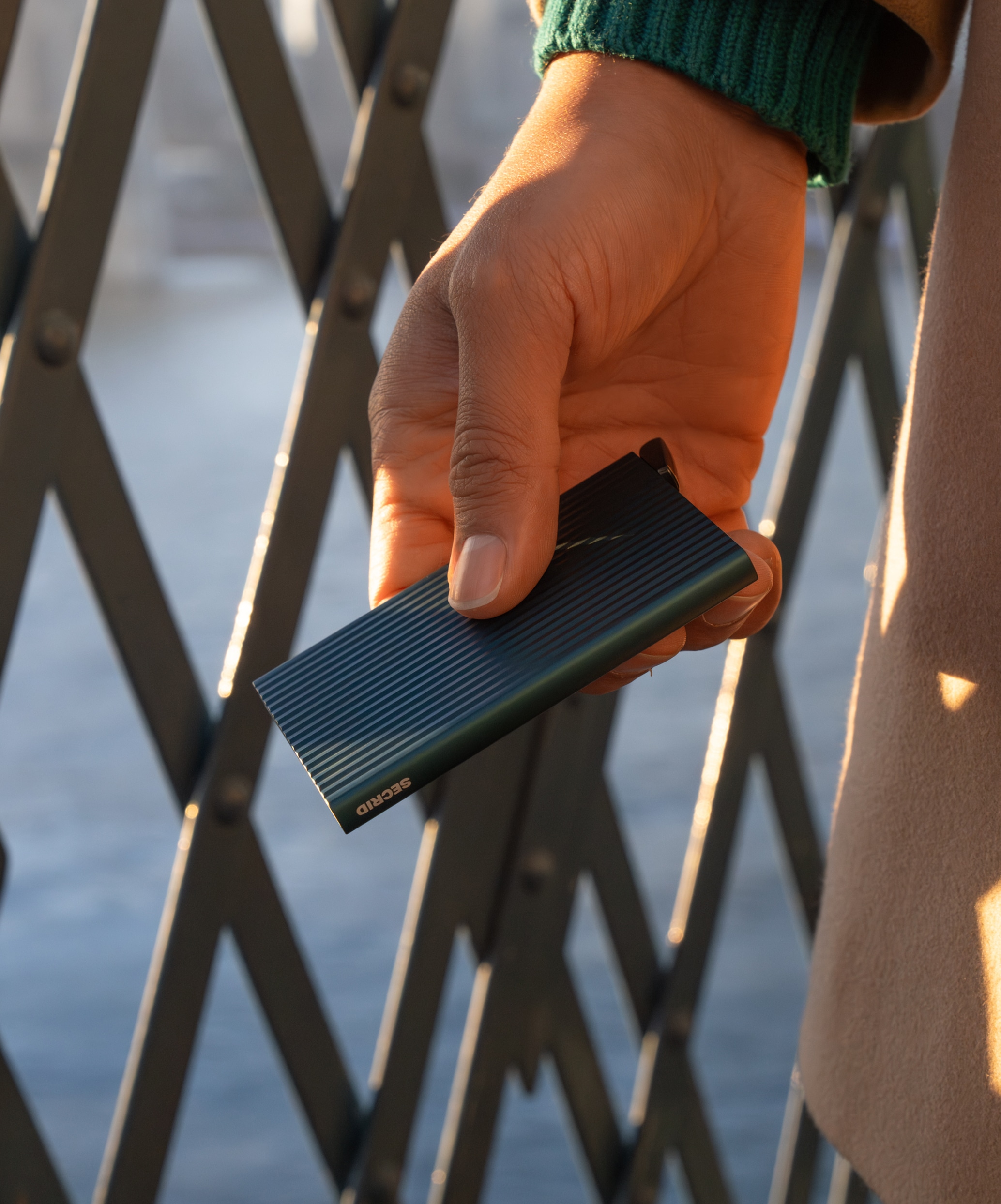 Real life image of the premium-cardprotector-fluted-teal-- wallet