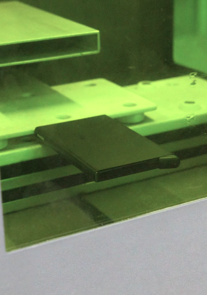 Laser machine engraving a Secrid cardprotector